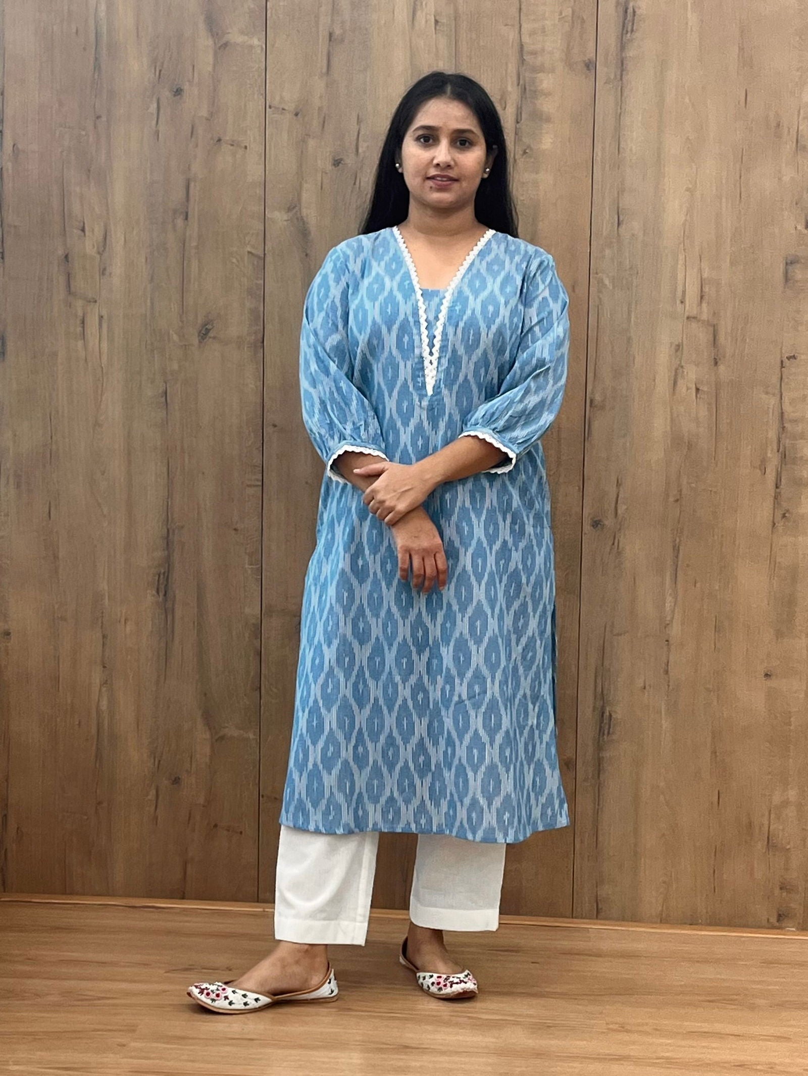 Sky blue ikkat kurta with lace neckline and pockets - Cult91