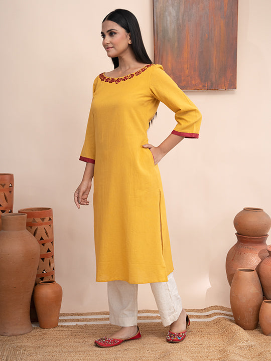 Yellow handloom cotton  kurta  with pockets and hand kashmiri thread embroidery