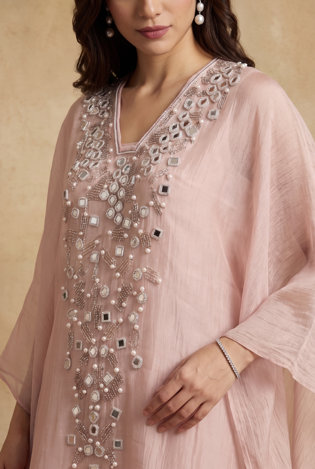 Peach Kaftan set with eligent Pearl work